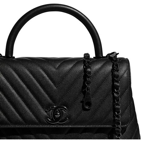 chanel sac rabat avec poignée à.